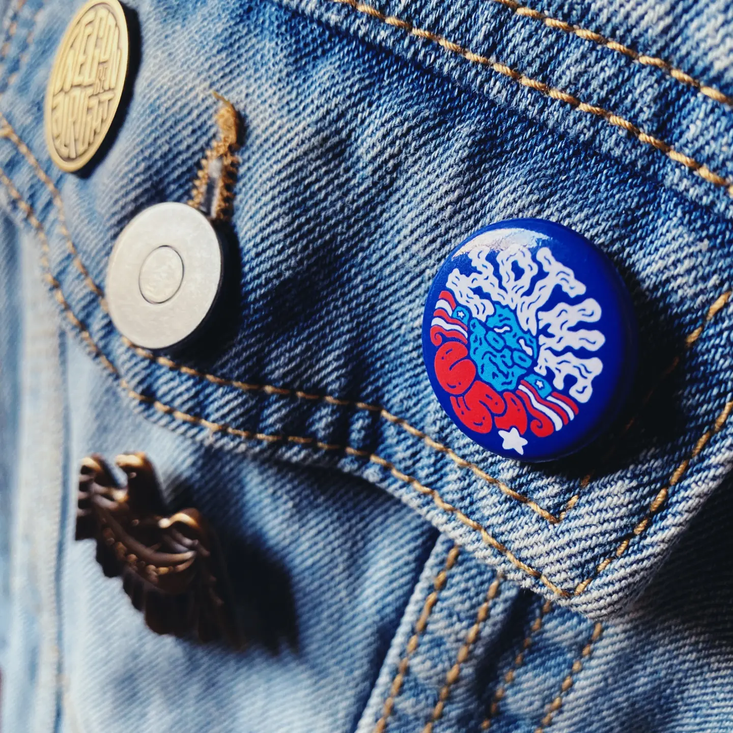 Bernie Sanders button on jacket